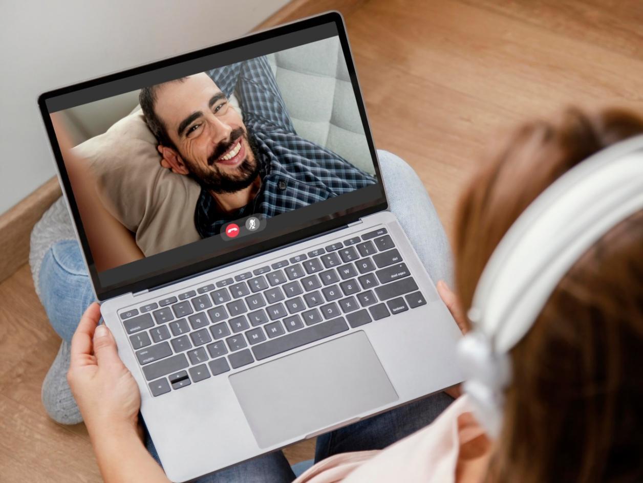 Students analyzing financial data on computers in modern classroom